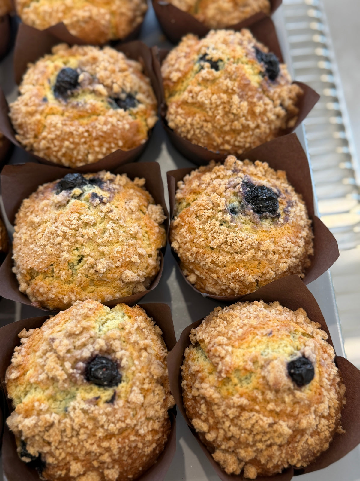 Blueberry muffins topped with golden crumble