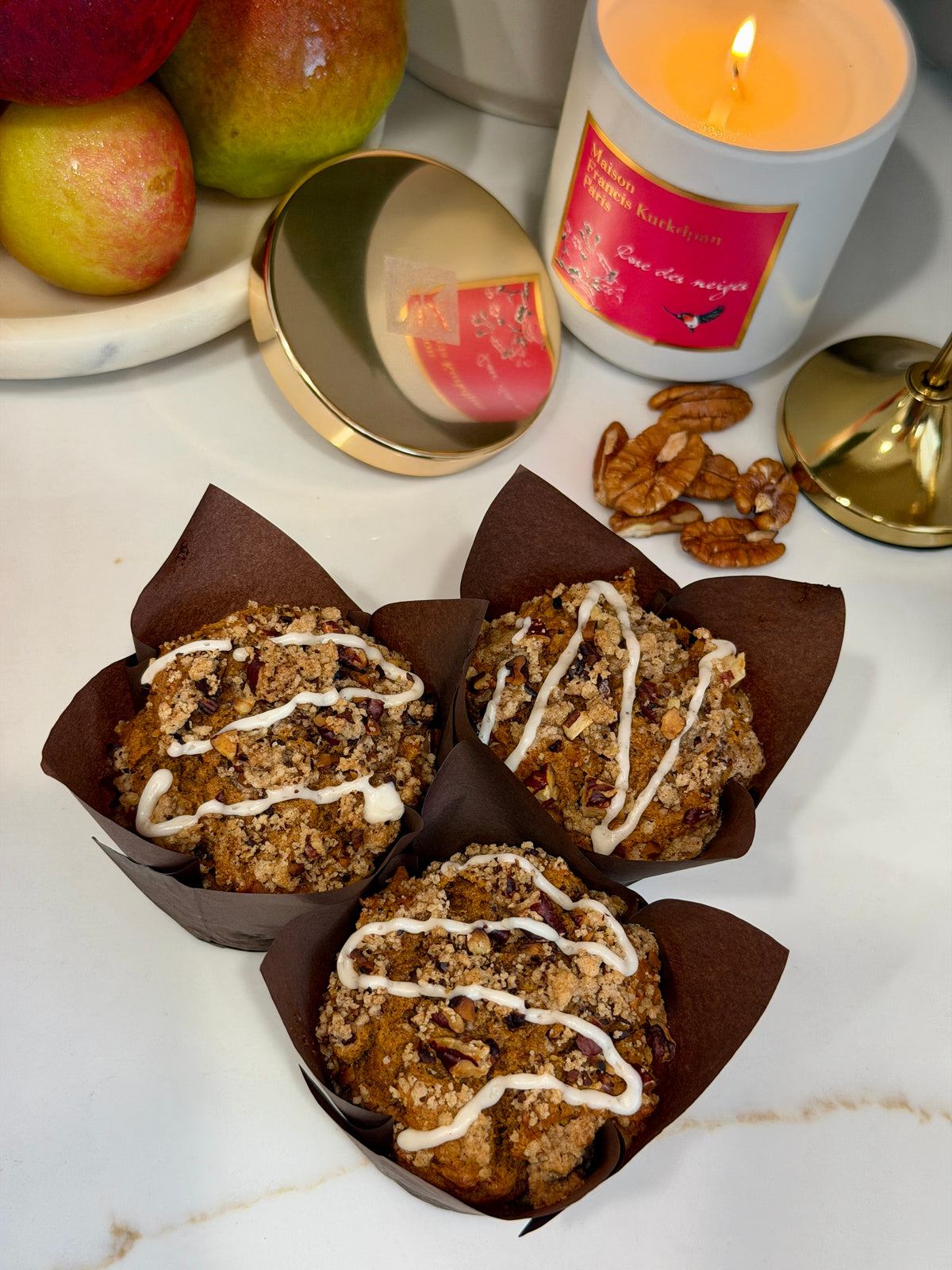Pumpkin pecan muffins with crumble and icing